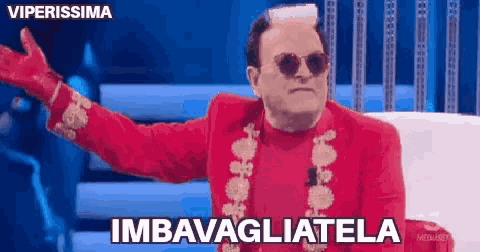 cristiano-malgioglio-imbavagliatela.gif