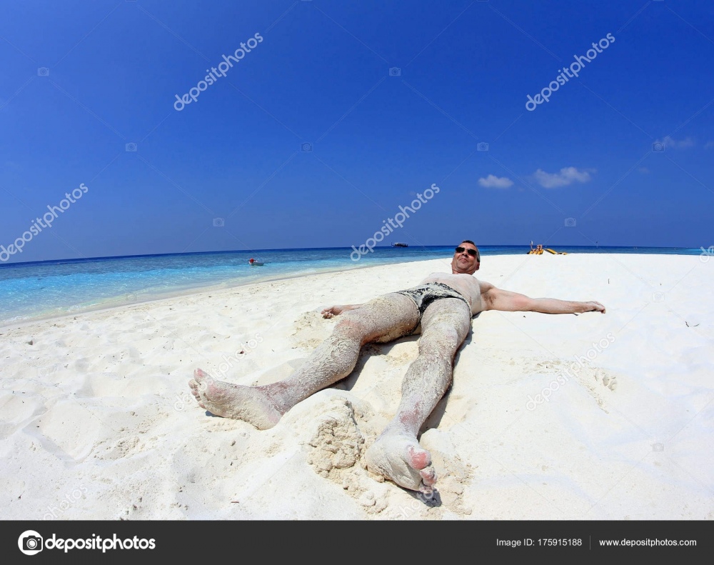 depositphotos_175915188-stock-photo-man-enjoying-holiday-sandy-beach.jpg